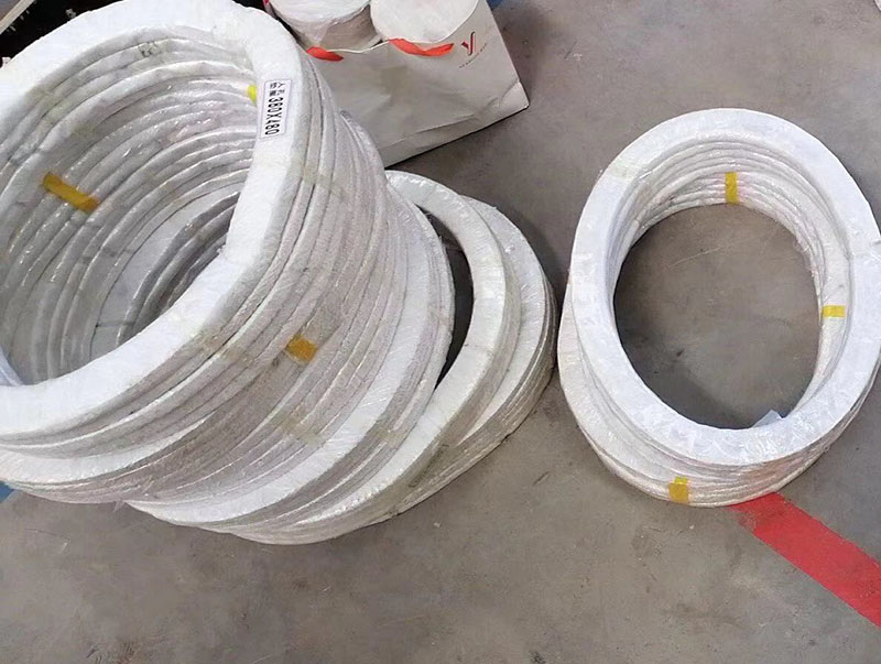 反應(yīng)釜四氟石棉墊，四氟包覆不銹鋼波紋板墊片.jpg